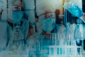 biopharma image-medical professionals in a lab looking at test tubes